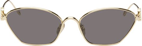 LOEWE: Gold Anagram Hexagonal Sunglasses.